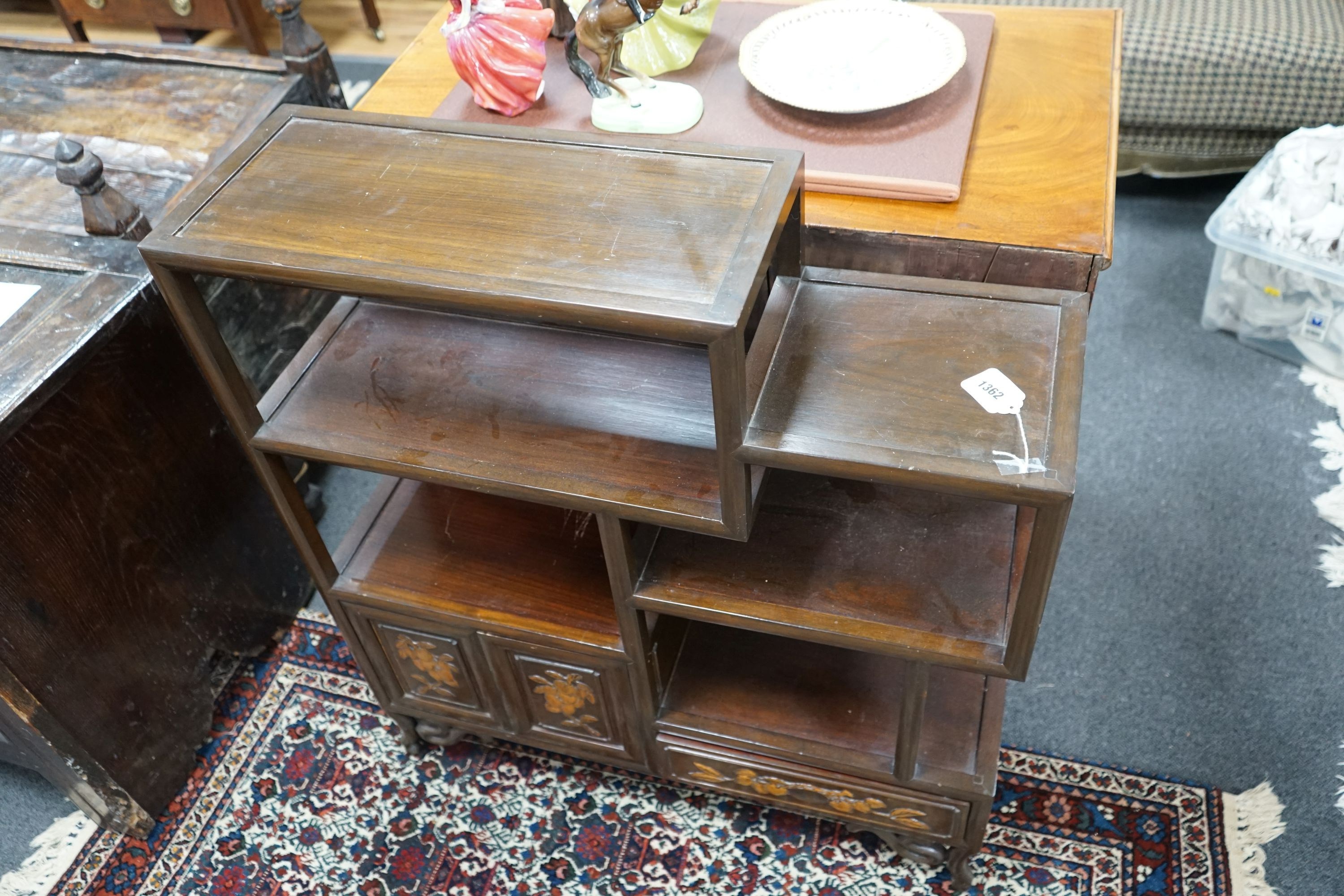 A Chinese elm tiered side cabinet, width 81cm, depth 26cm, height 91cm